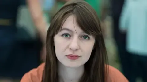 Sally Rooney claims she cannot travel to the UK because of legal concerns