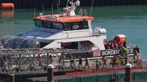 First British Legal Objection Lodged Opposing 'One In, One Out' Deal